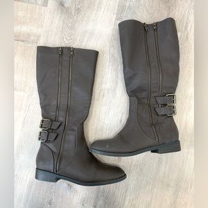 Express brown boots with zipper detail.